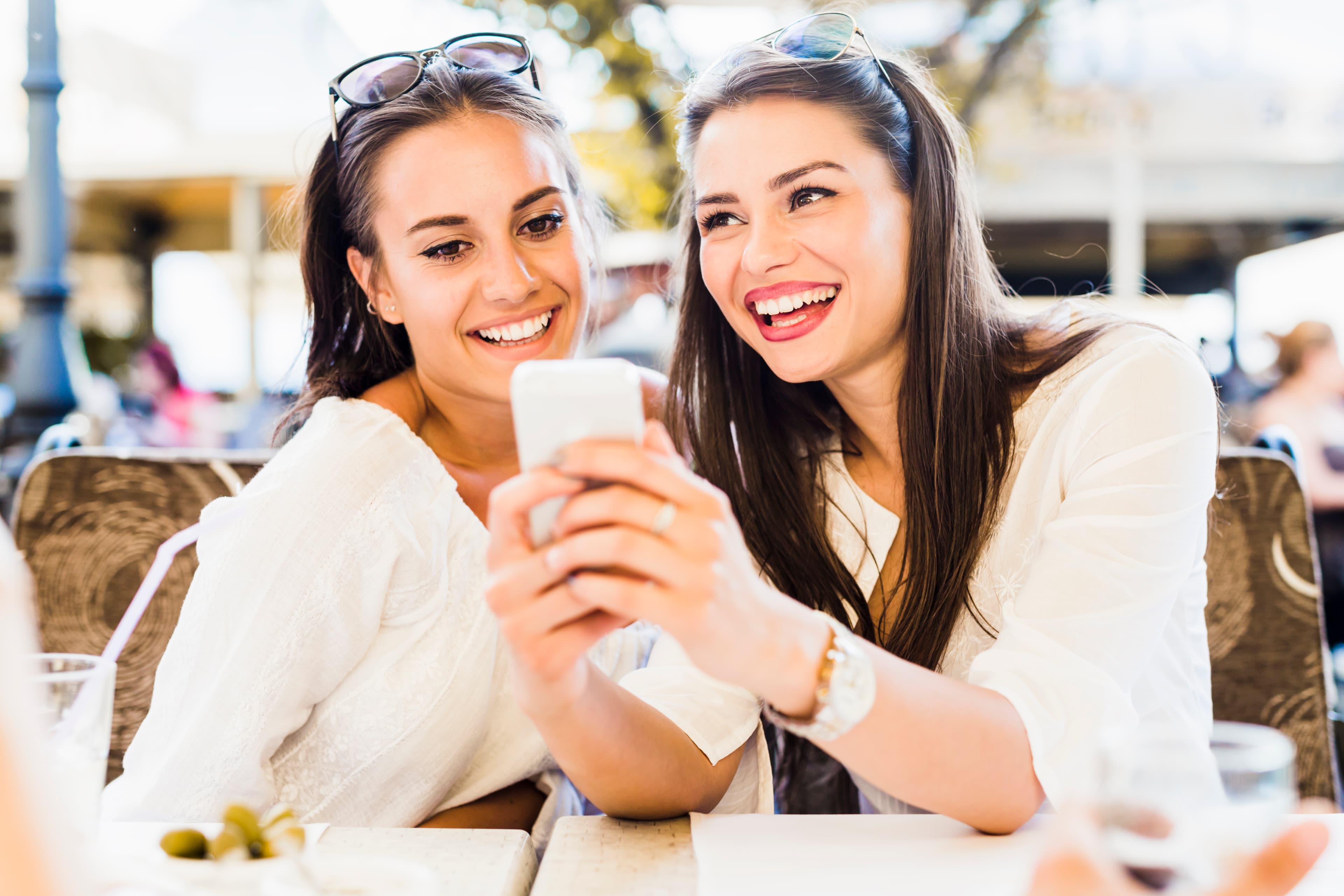 Person feeling overwhelmed while working on a laptop.