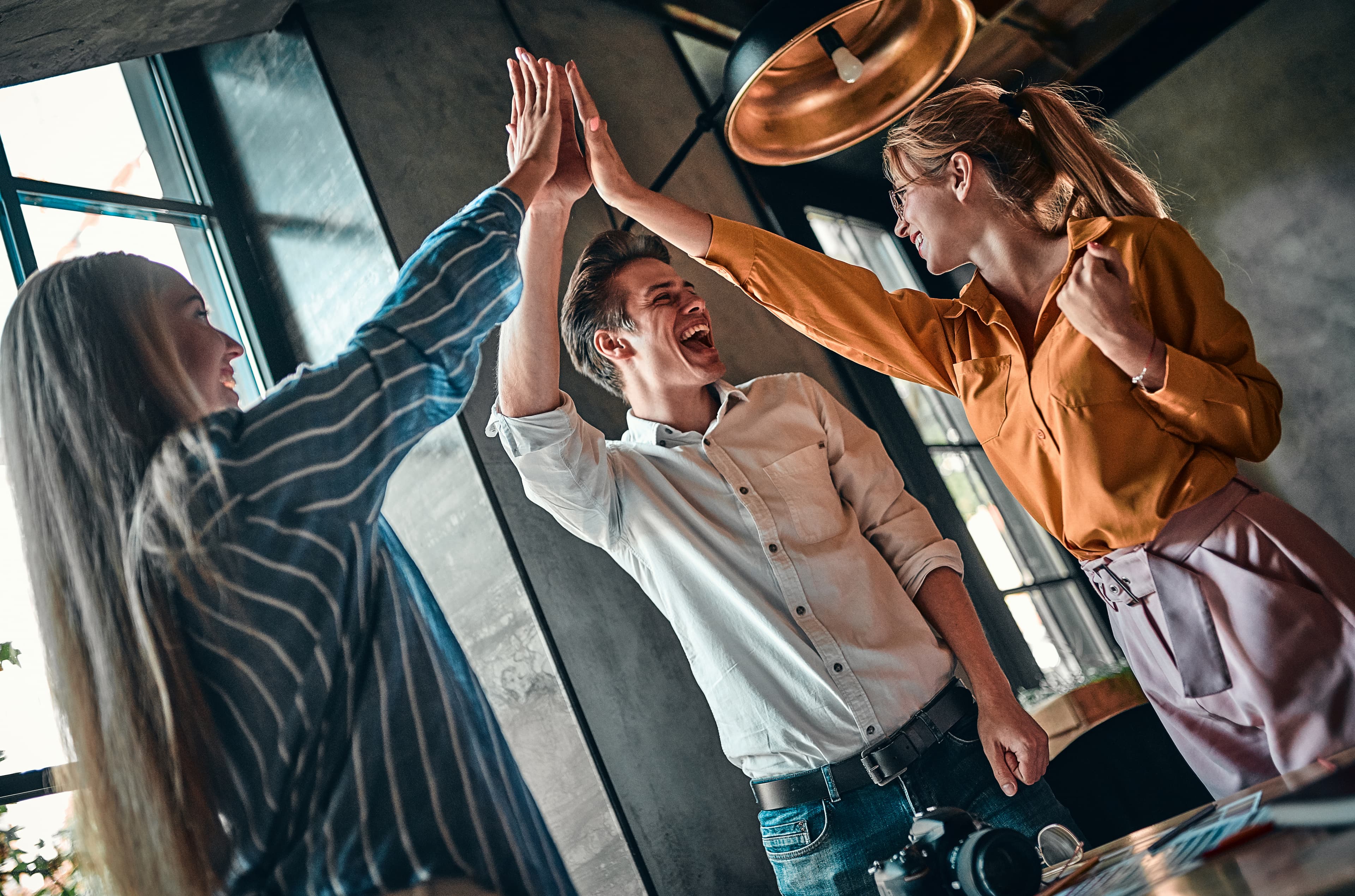 A group collaborating together around a table.